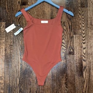 Never worn artizia bodysuit in rich copper